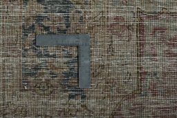 Backside of handmade 1950s Kerman rug showing knot structure and weave density