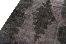 Backside of handmade 1950s Kerman rug showing knot structure and weave density