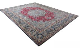 Close-up detail of 1950s Kerman rug from Iran / Persia showing Wool weave