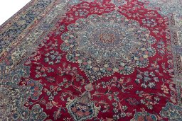 Backside of handmade 1950s Kerman rug showing knot structure and weave density