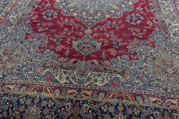 Close-up detail of 1950s Kerman rug from Iran / Persia showing Wool weave