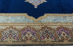Corner detail of 1970s Kerman rug showing border pattern and Wool pile