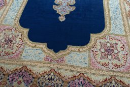 Close-up detail of 1970s Kerman rug from Iran / Persia showing Wool weave