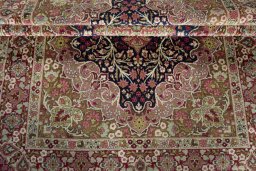 Corner detail of 1930s Kerman rug showing border pattern and Wool pile