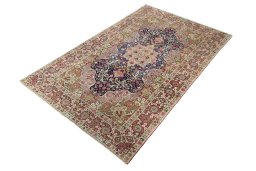 Corner detail of 1930s Kerman rug showing border pattern and Wool pile