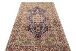 Surface texture of 1930s Kerman rug with natural Wool and intricate pattern