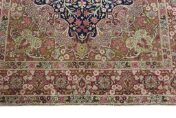 Close-up detail of 1930s Kerman rug from Iran / Persia showing Wool weave