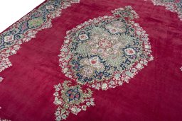 Backside of handmade 1970s Kerman rug showing knot structure and weave density
