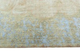 Corner detail of 1970s Kerman rug showing border pattern and Wool pile