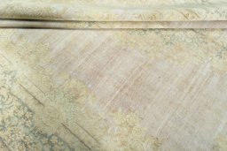 Close-up detail of 1970s Kerman rug from Iran / Persia showing Wool weave
