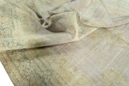 Surface texture of 1970s Kerman rug with natural Wool and intricate pattern