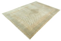 Corner detail of 1970s Kerman rug showing border pattern and Wool pile