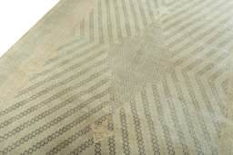 Backside of handmade 1970s Kerman rug showing knot structure and weave density