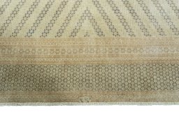 Full view of 1970s Kerman rug from Iran / Persia, 328 × 234 cm in Beige tones
