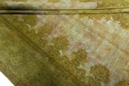 Close-up detail of 1970s Kerman rug from Iran / Persia showing Wool weave
