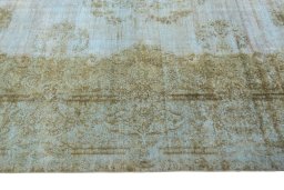 Corner detail of 1970s Kerman rug showing border pattern and Wool pile