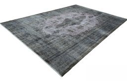 Corner detail of 1970s Kerman rug showing border pattern and Wool pile