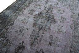 Backside of handmade 1970s Kerman rug showing knot structure and weave density