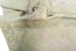 Surface texture of 1970s Kerman rug with natural Wool and intricate pattern