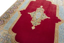 Backside of handmade 1970s Kerman rug showing knot structure and weave density