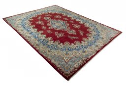 Close-up detail of 2000s Kerman rug from Iran / Persia showing Wool weave