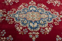 Central medallion detail of 2000s Kerman rug from Iran / Persia