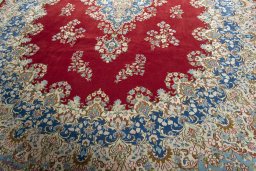 Close-up detail of 2000s Kerman rug from Iran / Persia showing Wool weave