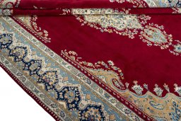Close-up detail of 2000s Kerman rug from Iran / Persia showing Wool weave
