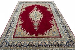 Surface texture of 2000s Kerman rug with natural Wool and intricate pattern