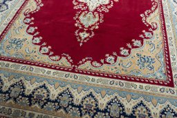 Close-up detail of 2000s Kerman rug from Iran / Persia showing Wool weave