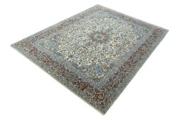 Corner detail of 2000s Kerman rug showing border pattern and Wool pile