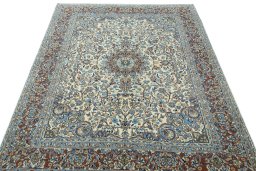 Surface texture of 2000s Kerman rug with natural Wool and intricate pattern