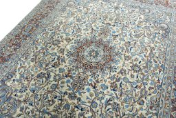 Backside of handmade 2000s Kerman rug showing knot structure and weave density
