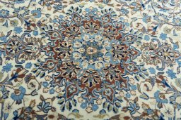 Central medallion detail of 2000s Kerman rug from Iran / Persia