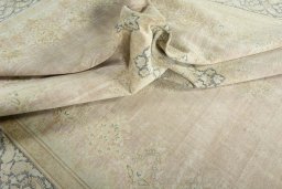Surface texture of 1950s Kerman rug with natural Wool and intricate pattern