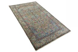 Close-up detail of 2000s Kerman rug from Iran / Persia showing Wool weave