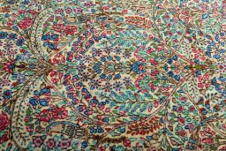 Central medallion detail of 2000s Kerman rug from Iran / Persia