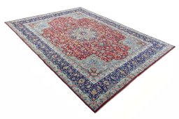 Close-up detail of 2000s Kerman rug from Iran / Persia showing Wool weave