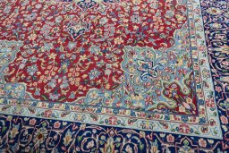 Close-up detail of 2000s Kerman rug from Iran / Persia showing Wool weave