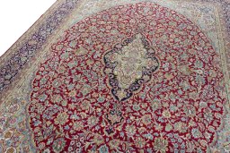 Backside of handmade 2000s Kerman rug showing knot structure and weave density