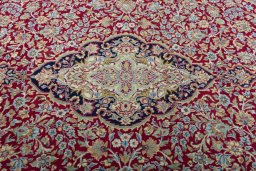 Central medallion detail of 2000s Kerman rug from Iran / Persia