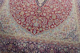 Close-up detail of 2000s Kerman rug from Iran / Persia showing Wool weave