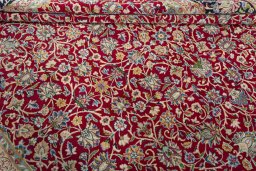 Close-up detail of 2000s Kerman rug from Iran / Persia showing Wool weave