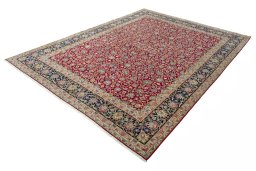 Corner detail of 2000s Kerman rug showing border pattern and Wool pile