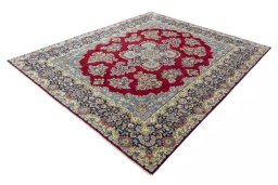 Corner detail of 2000s Kerman rug showing border pattern and Wool pile