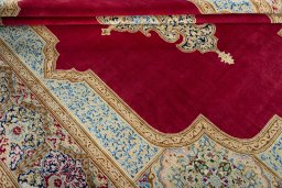 Close-up detail of 2000s Kerman rug from Iran / Persia showing Wool weave