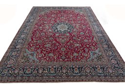 Surface texture of 2000s Kerman rug with natural Wool and intricate pattern