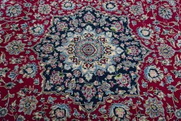 Central medallion detail of 2000s Kerman rug from Iran / Persia