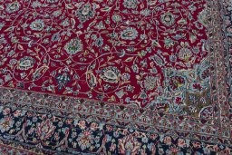 Close-up detail of 2000s Kerman rug from Iran / Persia showing Wool weave