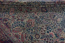 Close-up detail of 1930s Kerman rug from Iran / Persia showing Wool weave